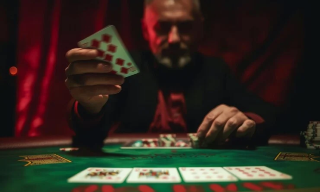 mature-man-throwing-playing-cards-table-one-mature-man-playing-poker-late-by-night-throwing-play_629685-94866